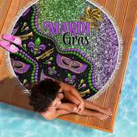 Round beach blanket featuring colorful Mardi Gras mask and beads, purple green glitter, fringe
