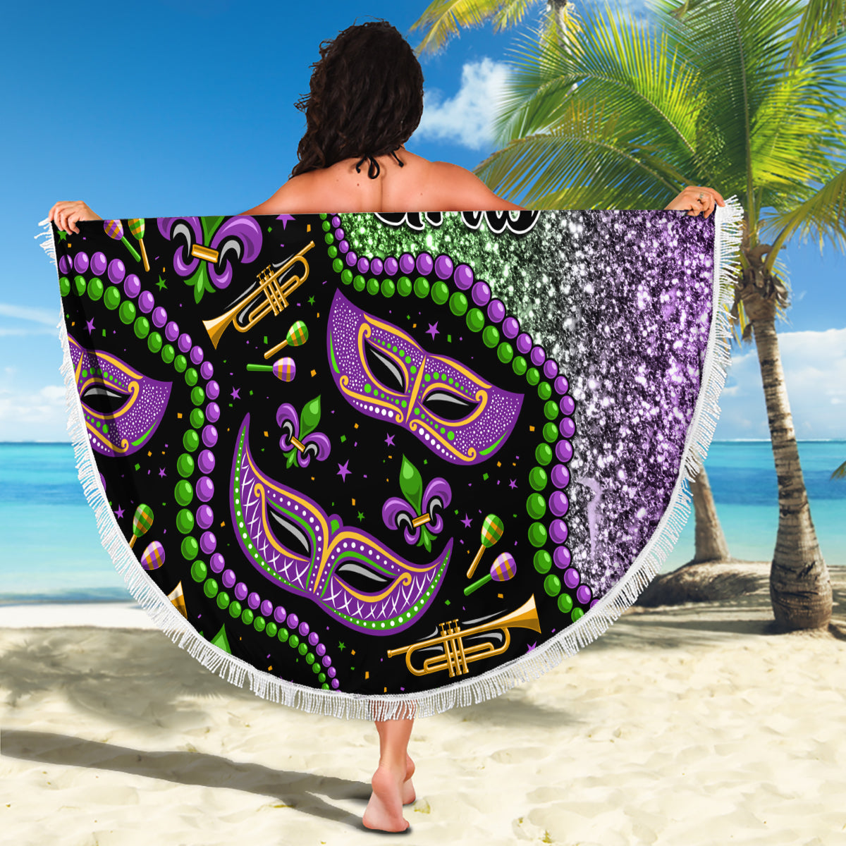 Round beach blanket with Mardi Gras mask face art in green and purple glitter, white fringe