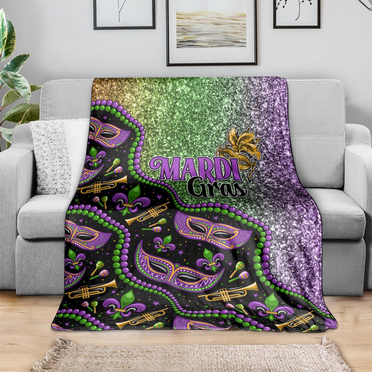 Mardi Gras blanket draped over sofa, glitter green and purple with mask and fleur pattern