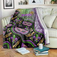 Mardi Gras blanket on sofa, glitter green and purple with masks, beads, and decorative text
