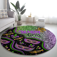 Round carpet with “MARDI Gras” design in purple, green, and black on the floor.