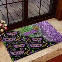 Mardi Gras rubber doormat with purple glitter right side and colorful mask pattern