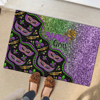 Mardi Gras rubber doormat with purple glitter area, green accents, and festive mask print