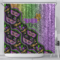 Mardi Gras shower curtain with black jester masks, Mardi Gras text, and purple glitter side