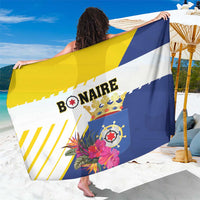 Bonaire tropical flower sarong, yellow and blue flag print with bold text