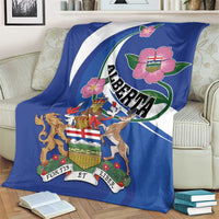 Blue Alberta crest blanket on sofa, wild rose flowers and Fortis et Liber ribbon trim