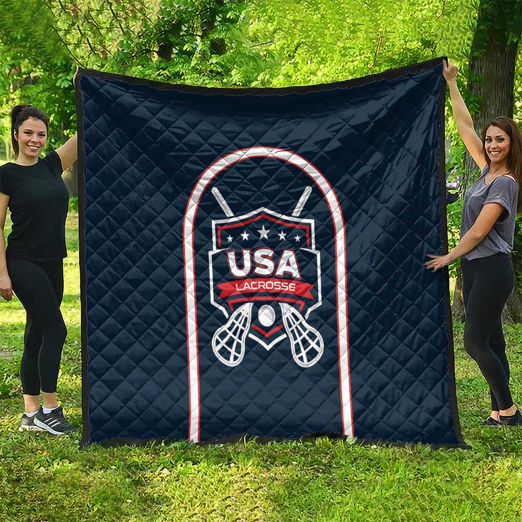 Navy blue lacrosse quilt blanket featuring USA Lacrosse shield logo and mesh goal design