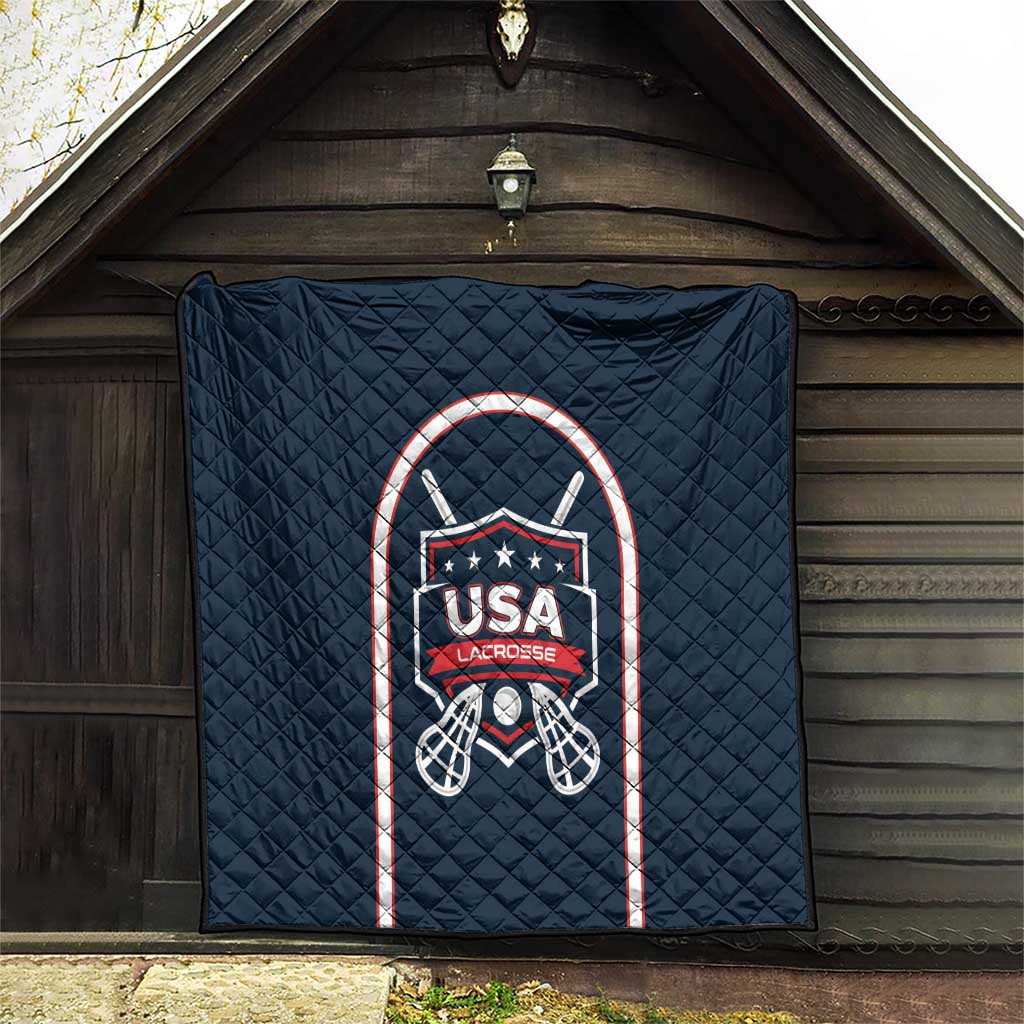 Navy blue lacrosse quilt with centered USA Lacrosse shield and goal net graphic