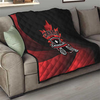 Canada Lacrosse quilt blanket on sofa, black and red quilt with Canada Lacrosse logo
