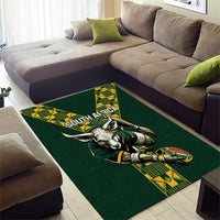 Green corner view of rugby area rug with South Africa logo, bull holding rugby ball, yellow accents