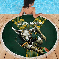 Green round beach blanket with fringe featuring South Africa and bull sports mascot graphic.