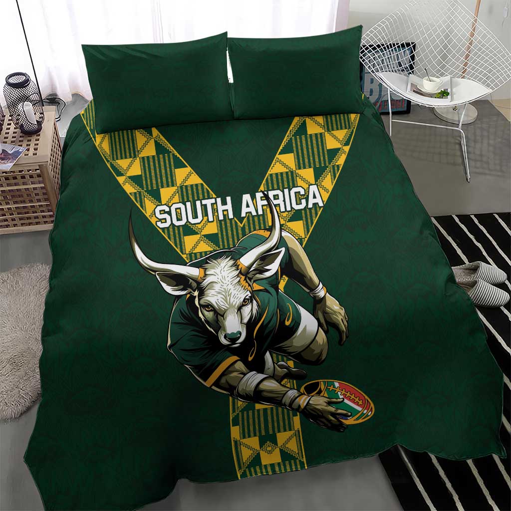 Green rugby bedding set on bed with South Africa text and antelope mascot graphic