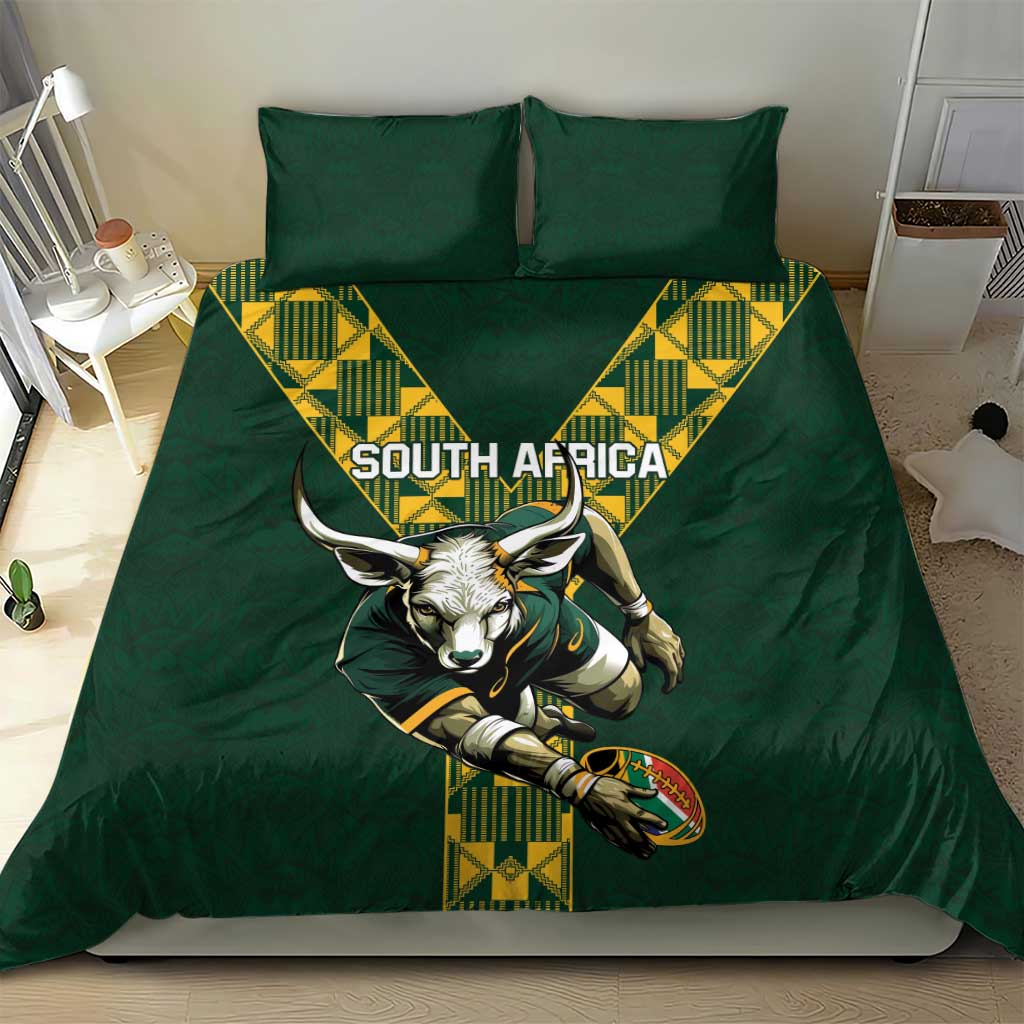 Green rugby bedding set on bed featuring South Africa text and antelope mascot print