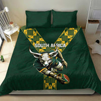 Green rugby bedding set on bed featuring South Africa text and antelope mascot print