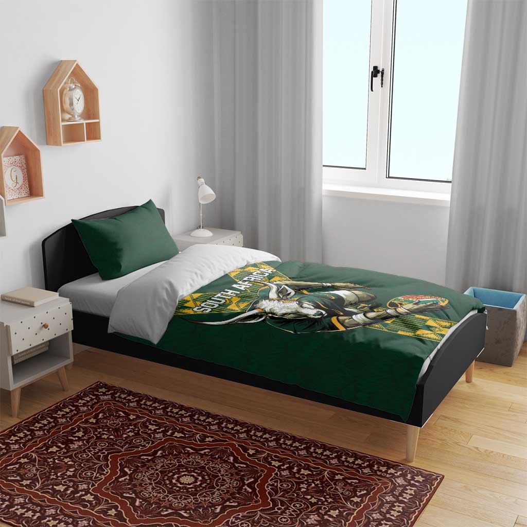Green rugby bedding set on bed with South Africa text and antelope mascot duvet cover