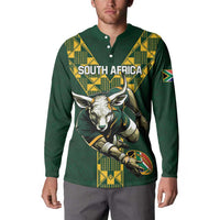 Green rugby button sweatshirt with South Africa text, animal mascot, and sleeve flag