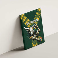 Green South Africa rugby canvas wall art angled on wall with bull mascot and ball