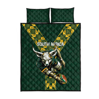 Green quilt bed set with centered South Africa text and springbok graphic, two pillowcases
