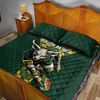 Green quilt bed set with springbok graphic and South Africa text, matching dark-green pillowcases