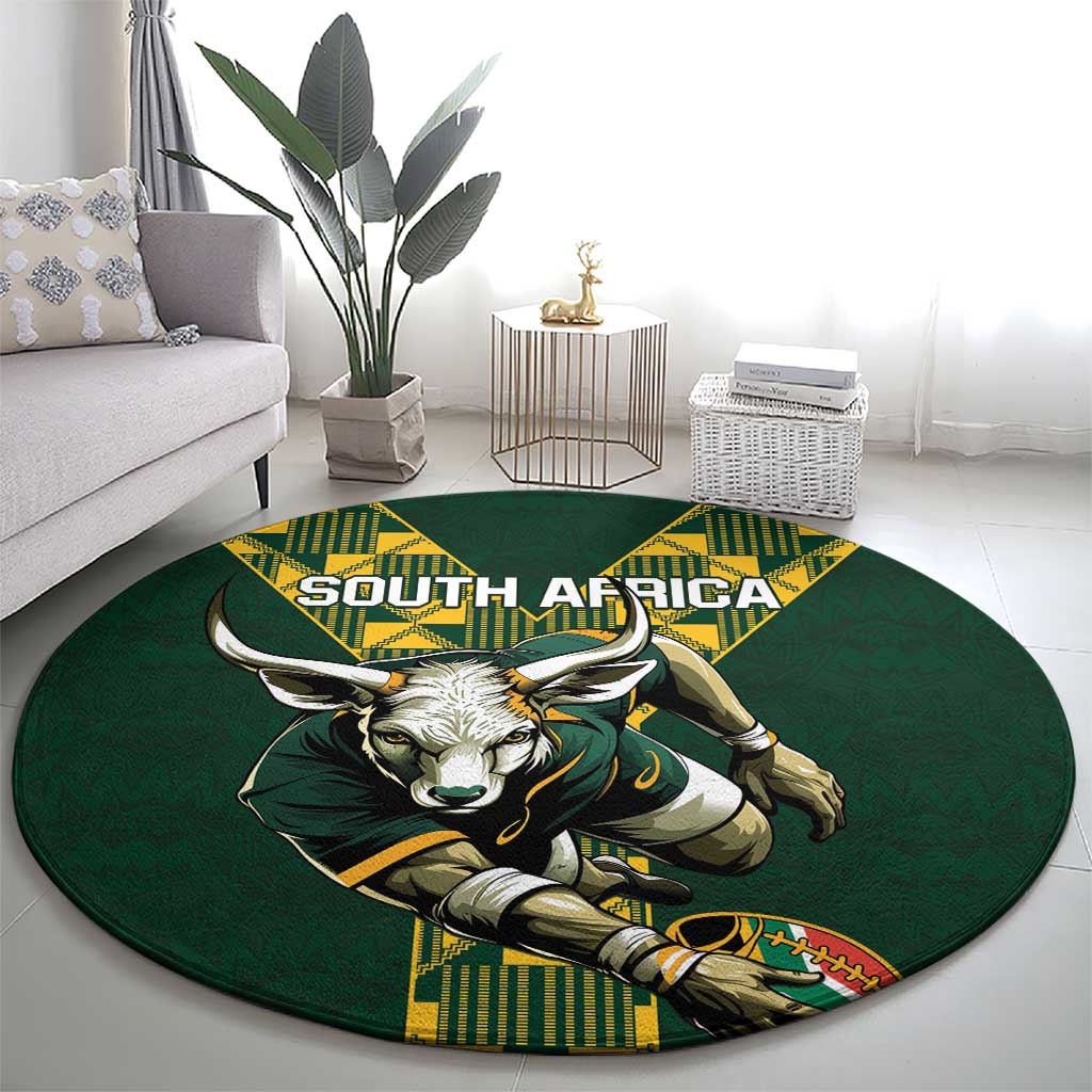 Green round rug with South Africa wordmark and charging bull mascot design with shield.
