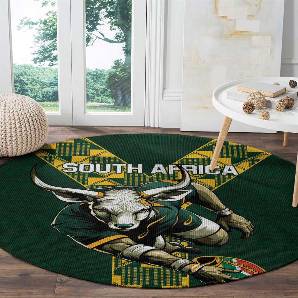 Green round rugby carpet with South Africa text and roaring bull graphic, yellow accents.