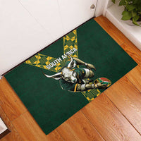 Green rugby doormat featuring springbok mascot stretching, South Africa title