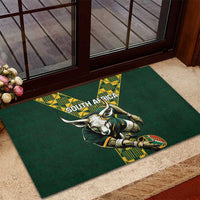 Green rugby doormat with springbok kicking ball graphic and South Africa text