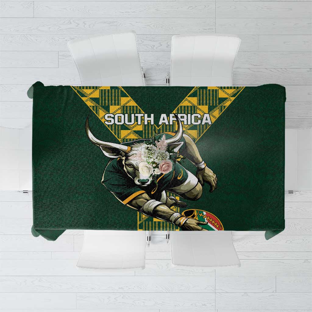 Green tablecloth featuring South Africa text and large bull emblem with yellow border