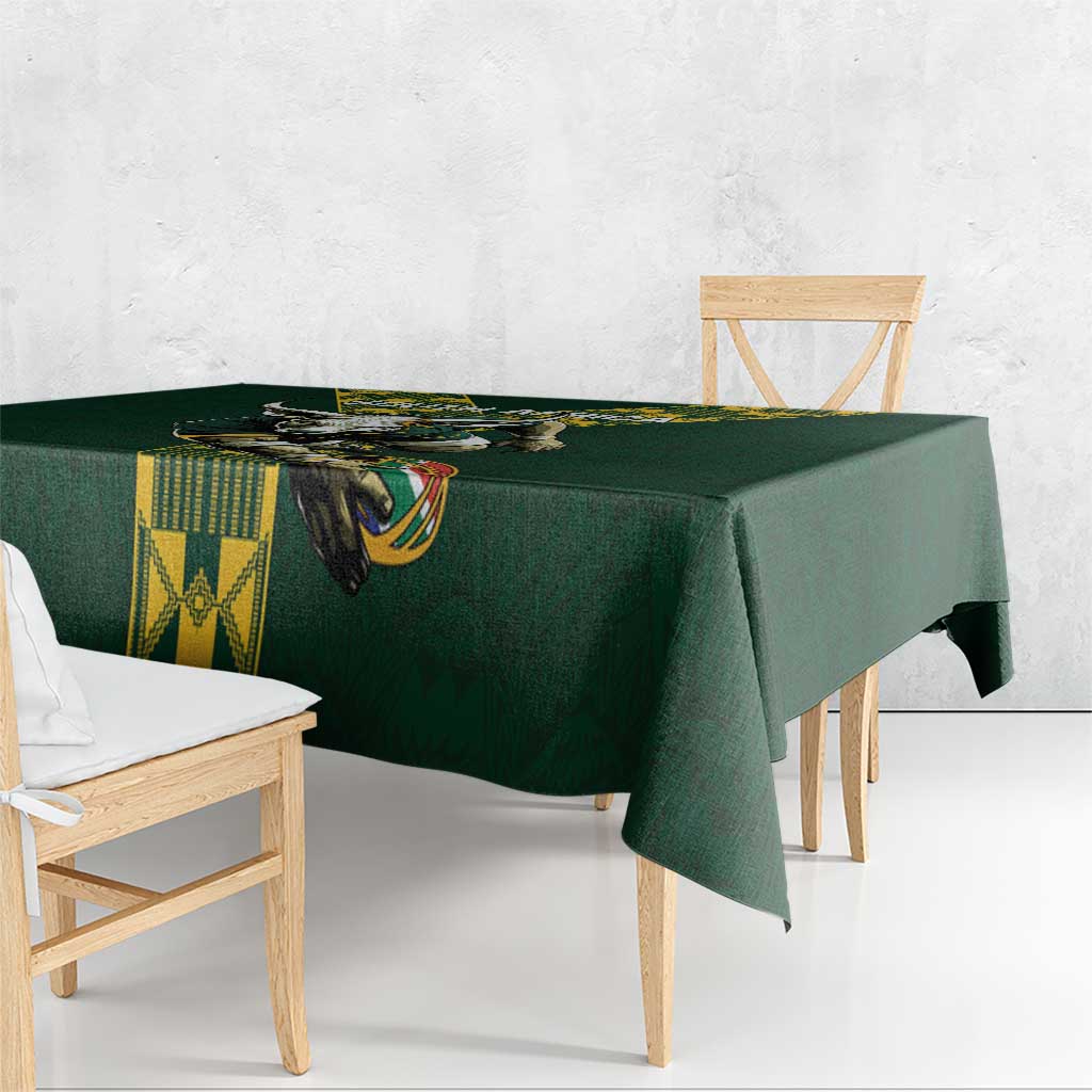 Green rugby-style tablecloth with bull emblem and yellow geometric blocks