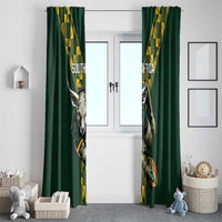 Green hanging curtains with South Africa rugby emblems and yellow patterned hanging bands