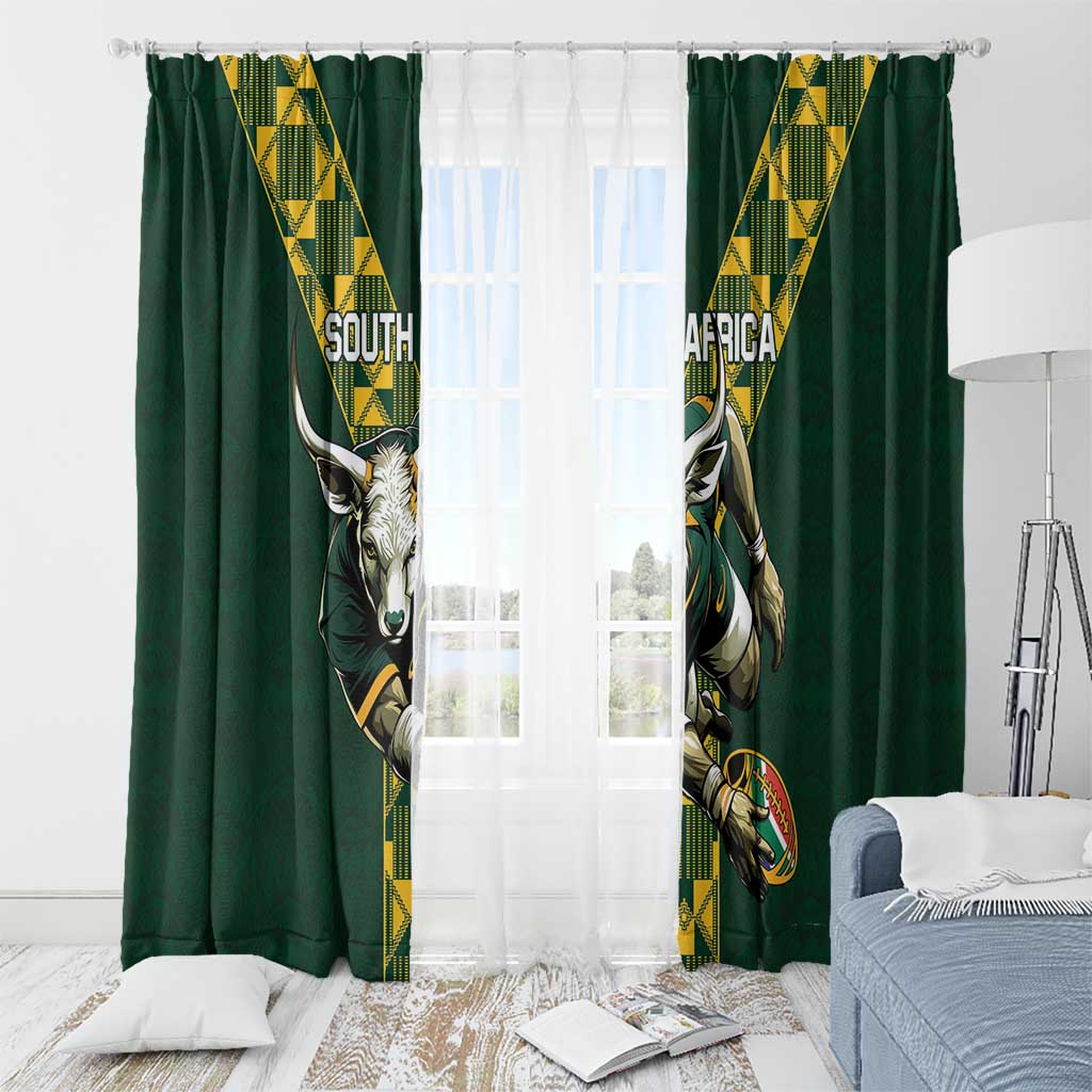 Green window curtains with South Africa rugby emblems and vertical yellow patterned stripes
