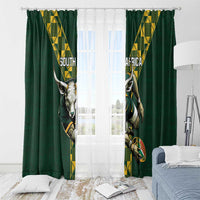 Green window curtains with South Africa rugby emblems and vertical yellow patterned stripes