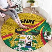 Round carpet with Benin Independence Day graphic in yellow, green, and red