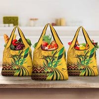Set of three yellow reusable tote bags with Jamaica 63 produce and reggae pattern
