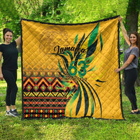 Yellow quilt showing "Jamaica 63" and Independence Day design with green accents