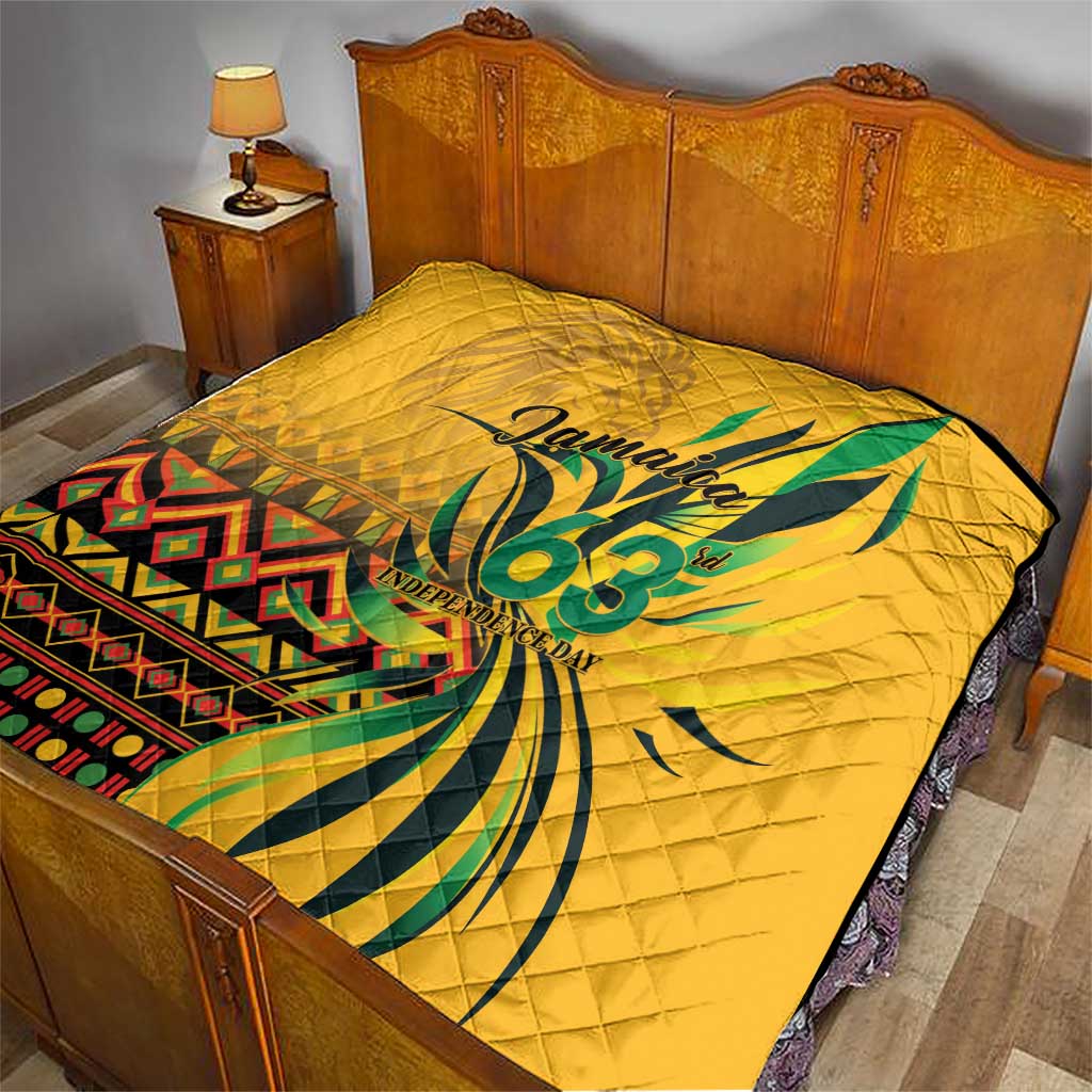 Yellow quilt on wooden bed with green "Jamaica 63" Independence Day print