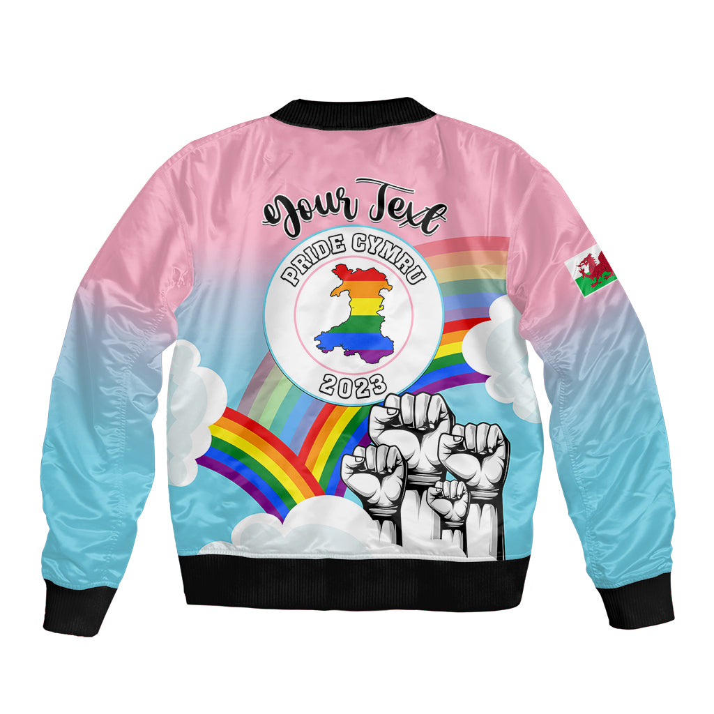 Rainbow pride bomber jacket back print with emblem, rainbow arcs, fists, black ribbed hem