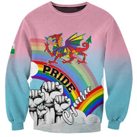 Unisex gradient pink-to-blue sweatshirt with rainbow Pride dragon and fist graphic