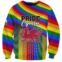 Rainbow pride sweatshirt with Pride Cymru logo and red Welsh dragon front print