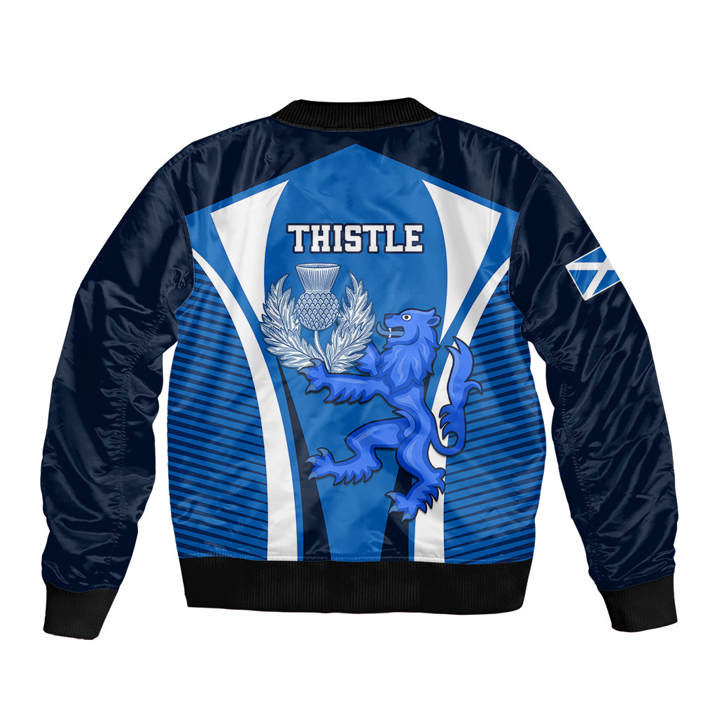Blue bomber jacket with ribbed hem and THISTLE back graphic featuring lion crest