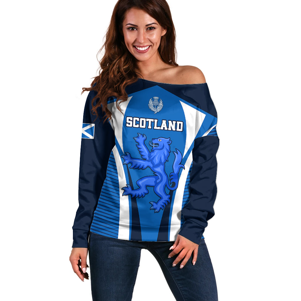 Blue off-shoulder rugby sweater with white stripes and Scotland crest lion graphic