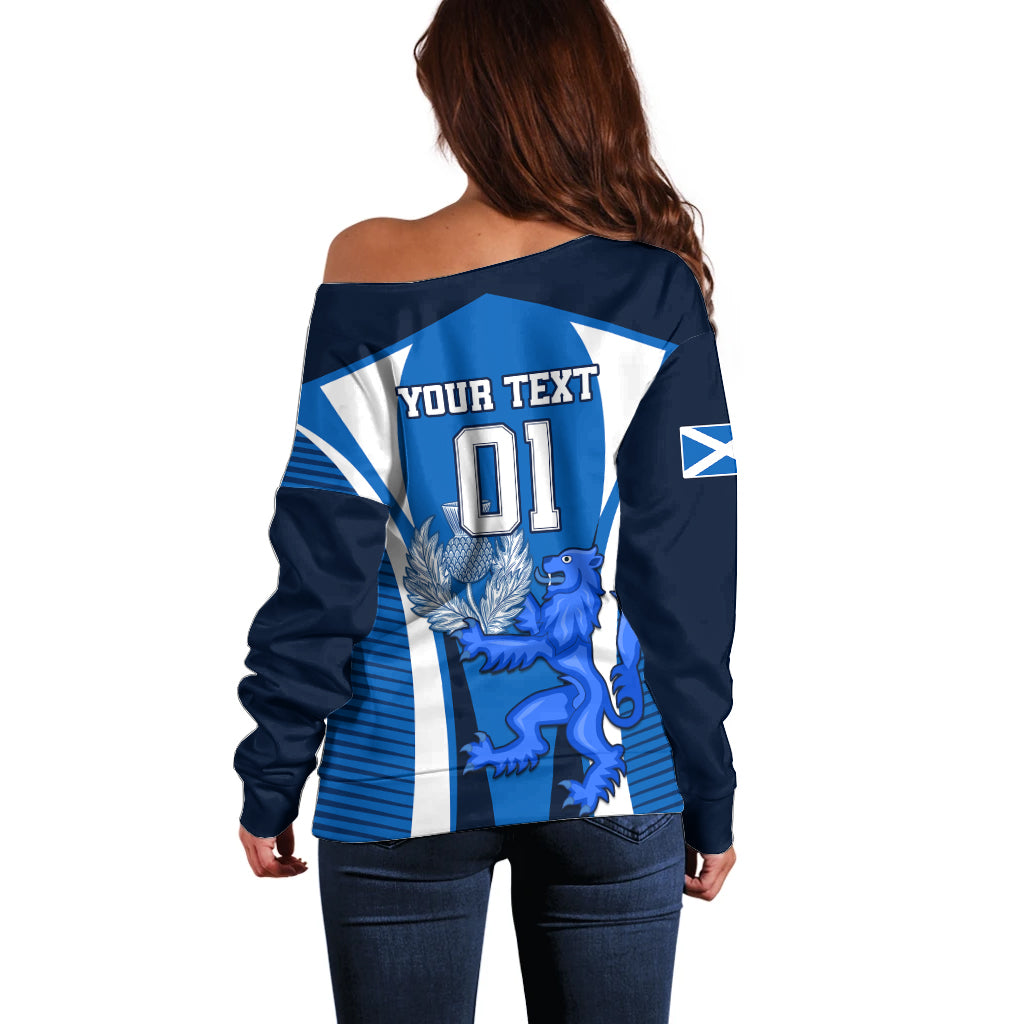 Blue off-shoulder sweater back with white stripes, "YOUR TEXT 01" and lion crest
