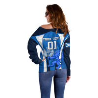 Blue off-shoulder sweater back view with "YOUR TEXT 01" lion crest and white stripes