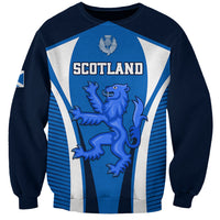 Blue Scotland rugby sweatshirt with lion crest and thistle graphic on front