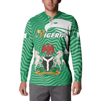 Green button-front sweatshirt with Nigeria crest graphic, white panel, and wavy stripe pattern