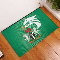 Green rubber doormat featuring Nigeria coat of arms and eagle emblem