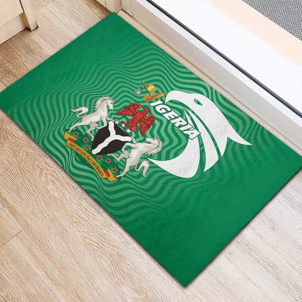 Green Nigeria-themed rubber doormat with crest shield and eagle figure