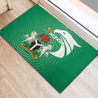 Green Nigeria-themed rubber doormat with crest shield and eagle figure