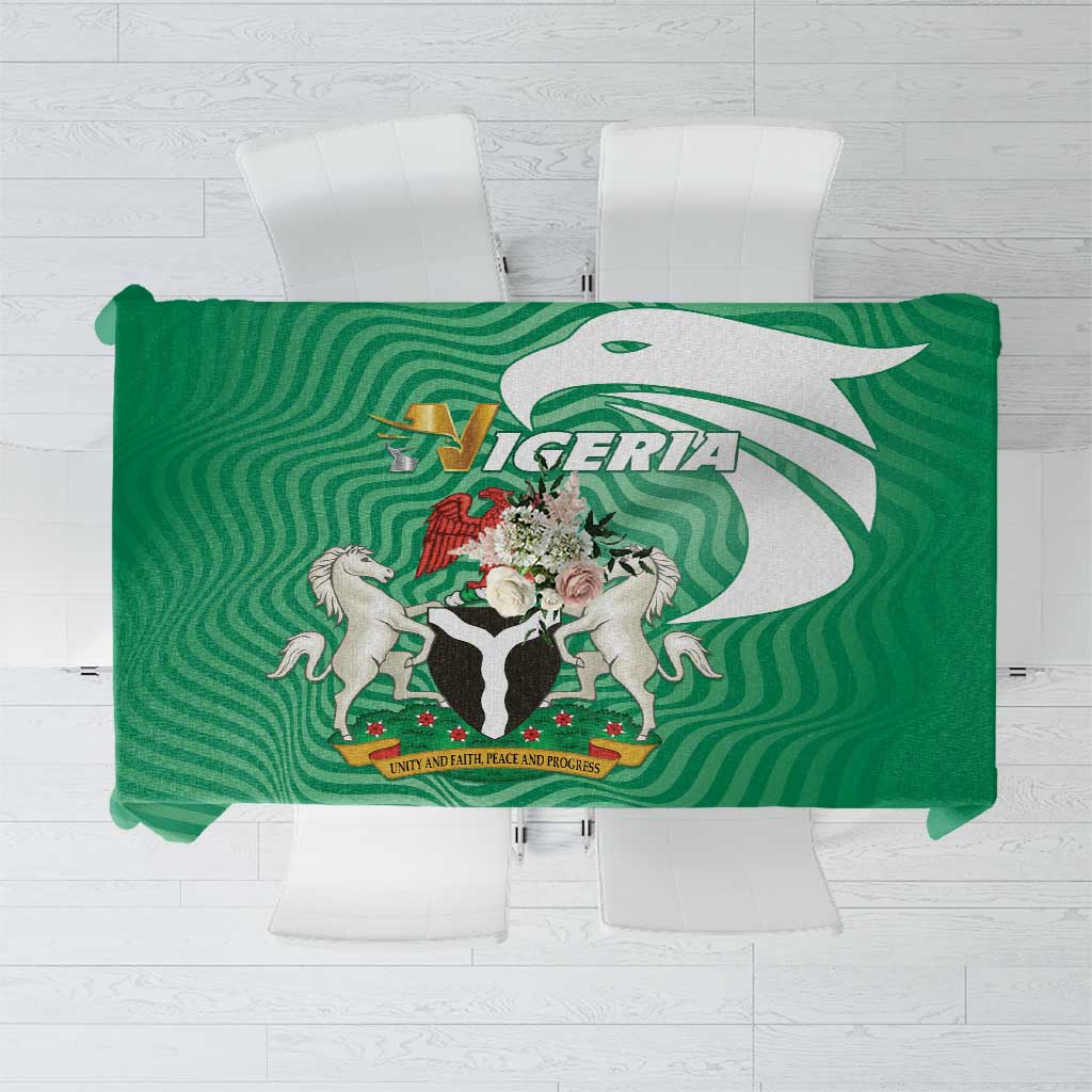 Green Nigeria tablecloth with wavy pattern and large crest emblem