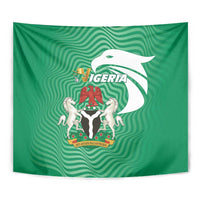 Green Nigeria flag tapestry with central coat of arms and white bird graphic, flat-hung view.